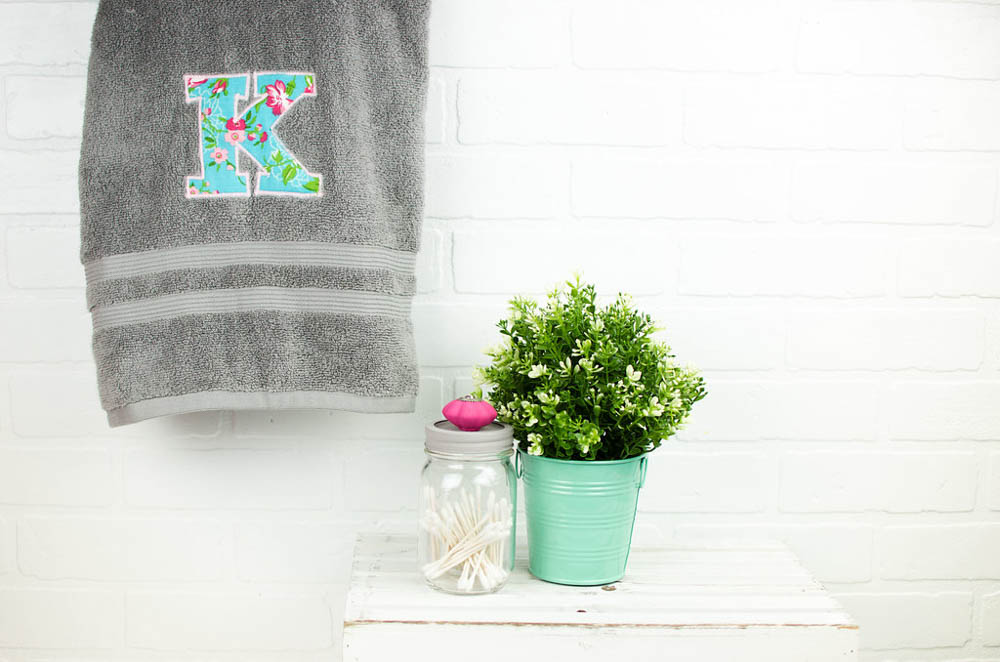 Color gray both towel with a beautiful letter K monogram on it