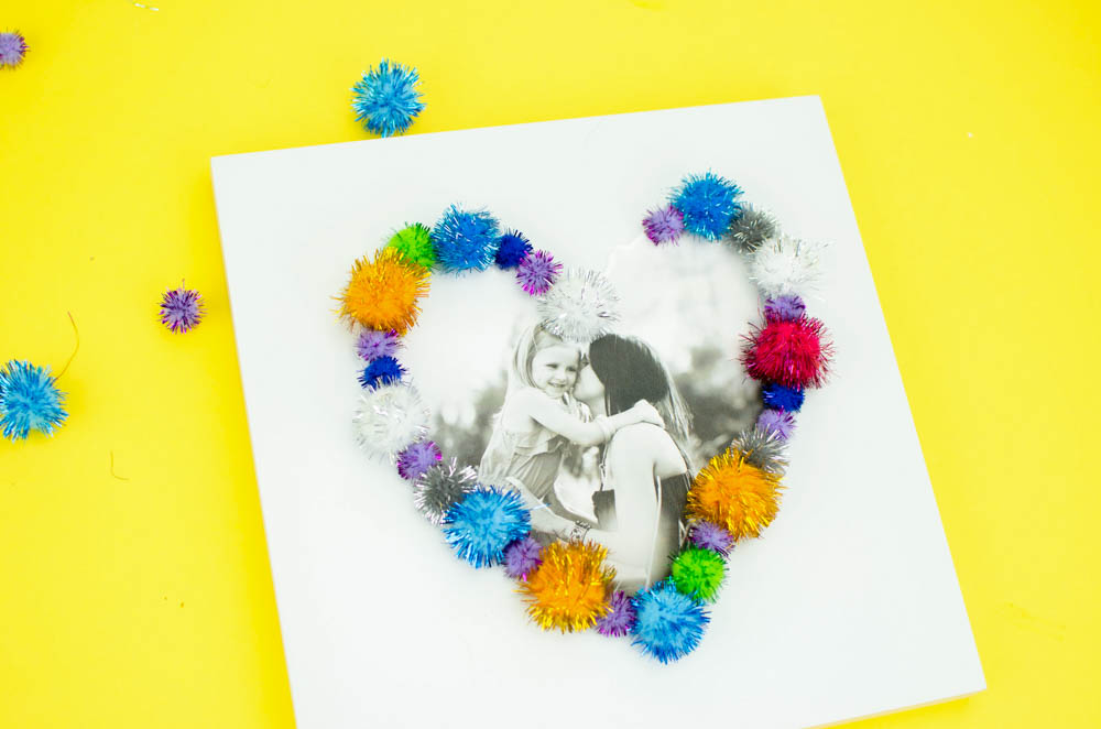 Pom Pom Framed Photo Canvas- a great babysitting craft idea!