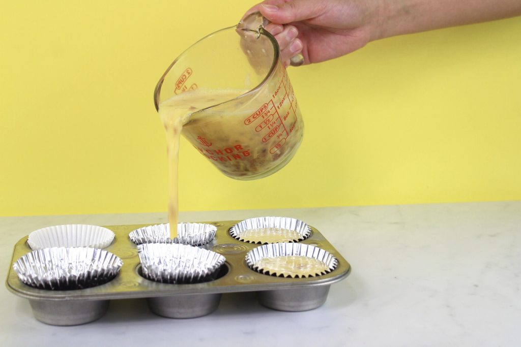 Pour Omelet Mixture Into a Muffin Tin For an On The Go Breakfast