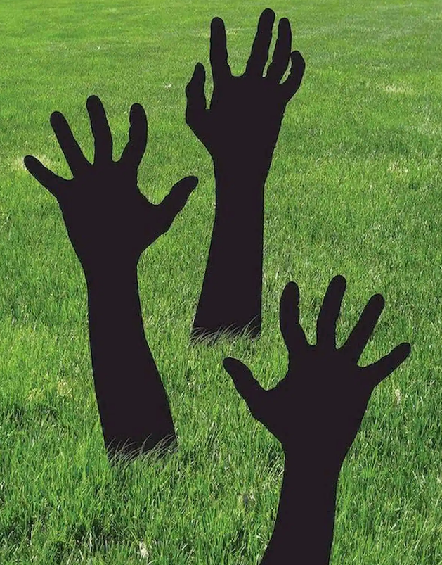 hands reaching up from the ground
