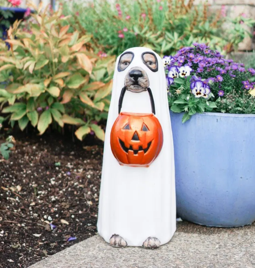 dog statue turned into ghost for halloween
