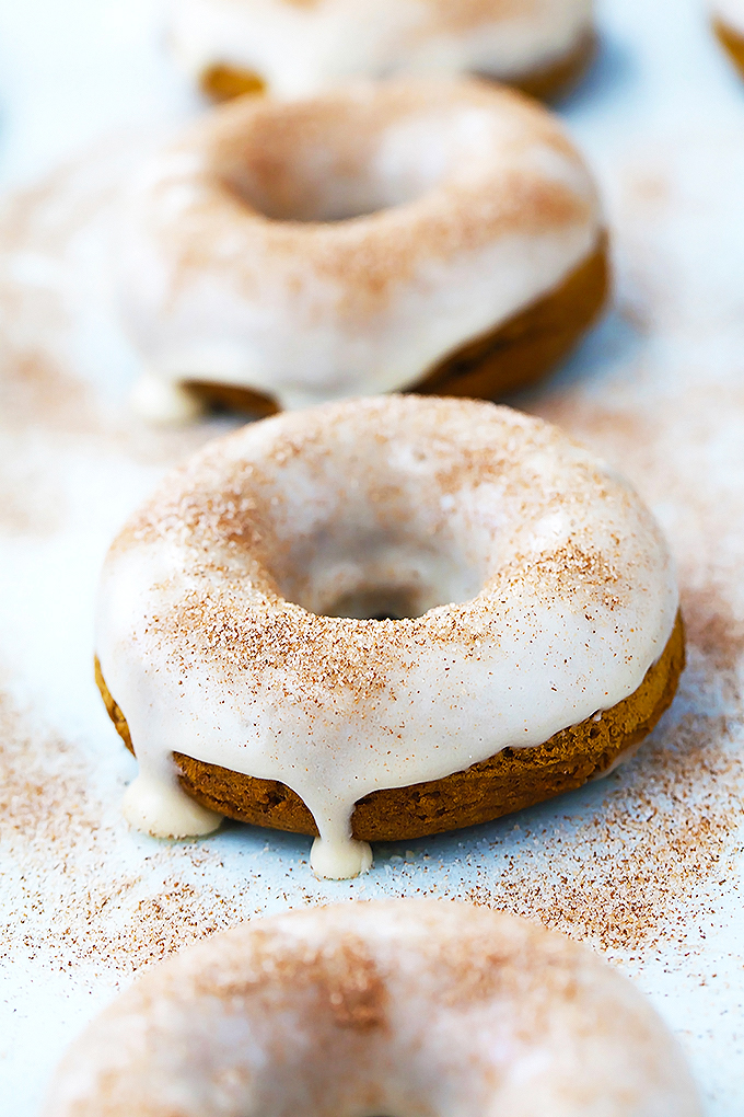 Baked pumpkin donuts with maple glaze and cinnamon-sugar
