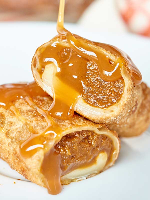 Pumpkin pie egg rolls with white chocolate cool whip and ooey-gooey caramel
