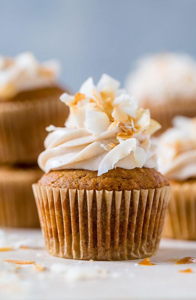 Moist and fluffy Pumpkin Coconut Cupcakes stuffed with Dulce de Leche and covered in Cinnamon Cream Cheese frosting