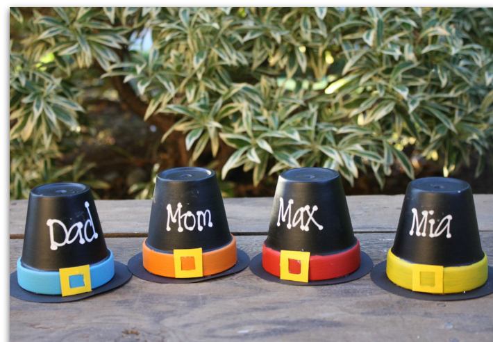 clay pots painted to look like pilgrim hats