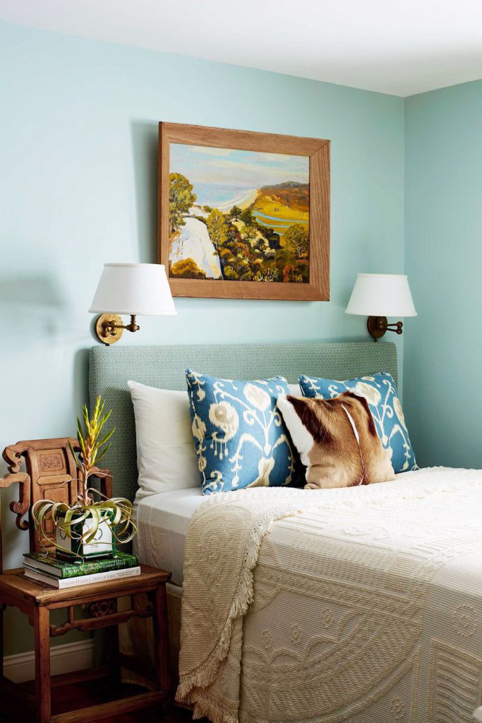 use wall sconces in place of lamps to save space