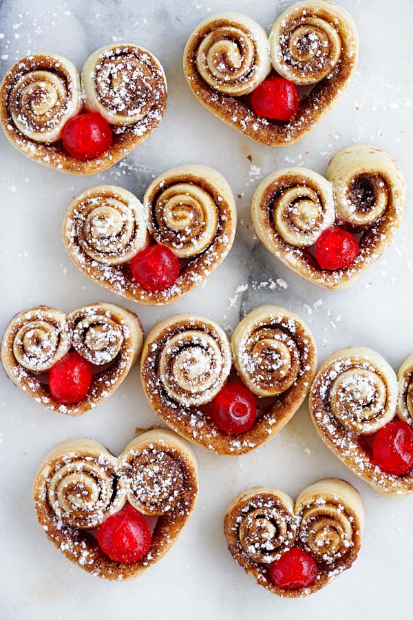 Cutest heart shaped cinnamon rolls stuffed with red cherries