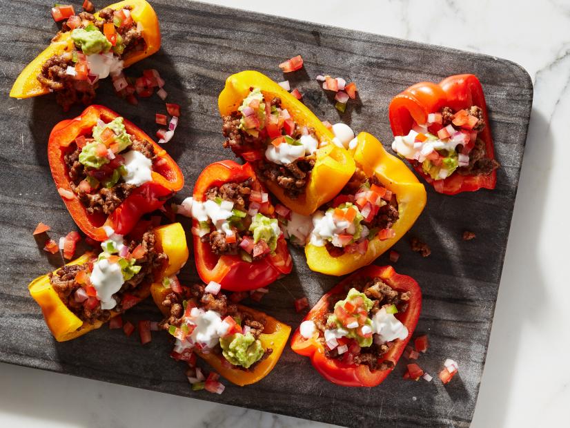 bell pepper keto nachos with beef, cheese, guac, pico de gallo and sour cream