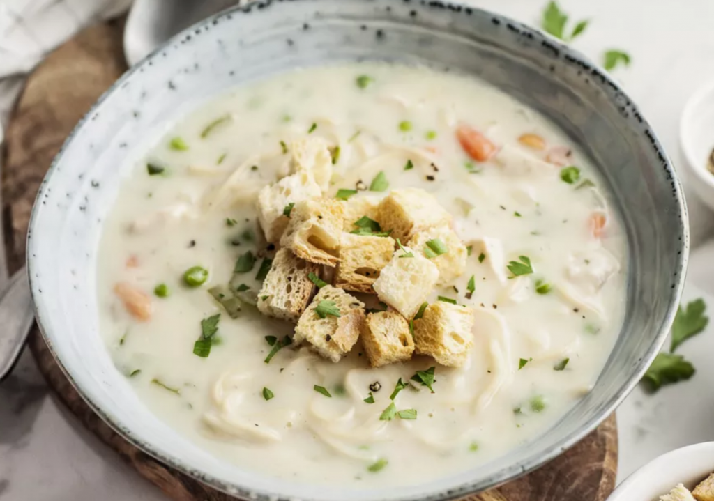 quick and easy creamy chicken noodle soup topped with croutons