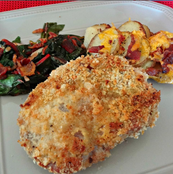 Oven fried pork chops served with veggies