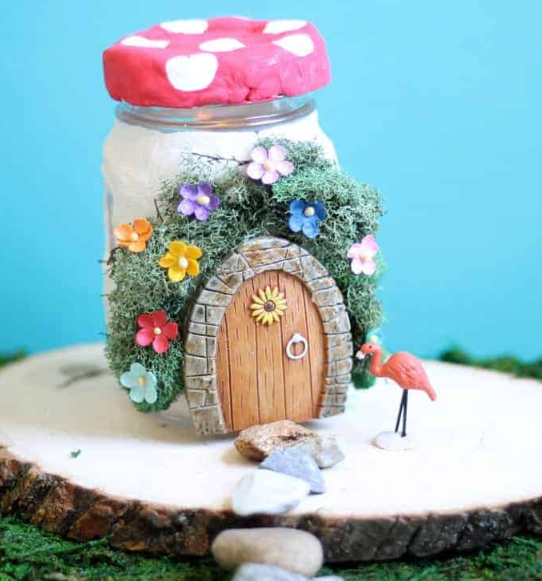 air dry clay fairy house made from a jar