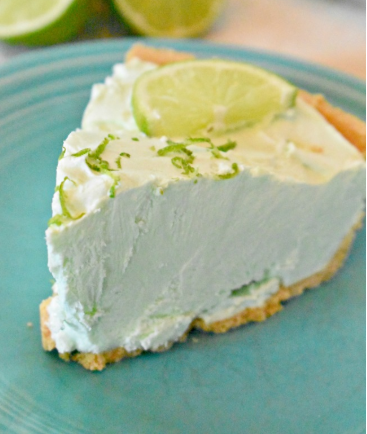Frozen key lime pie topped with a sliced of lime 