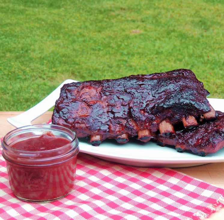 A mouth watering slab of BBQ ribs rub with a roasted strawberry BBQ sauce