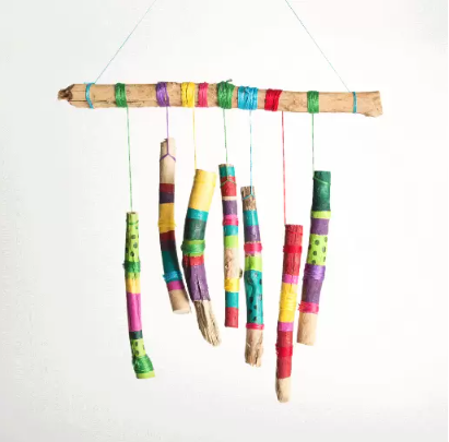 Stick wind chimes decorated with various colors of acrylic paint onto sticks and embroidery floss