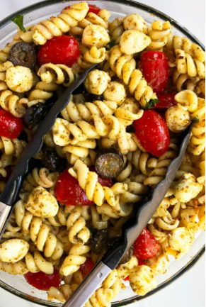Basil pesto pasta salad with mozzarella and cherry tomatoes