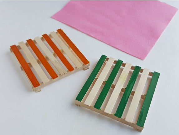 A very cute and useful homemade popsicle stick coasters