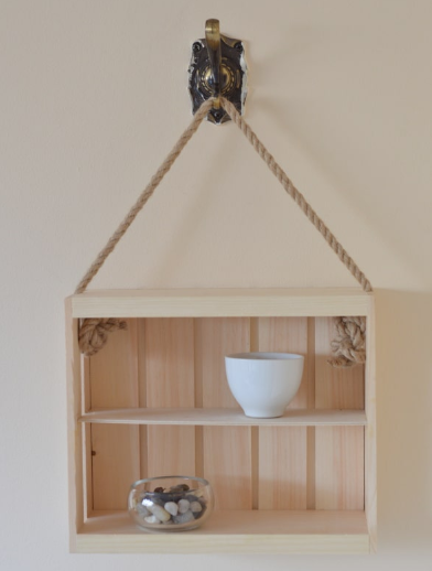 A simple rope and crate shelf