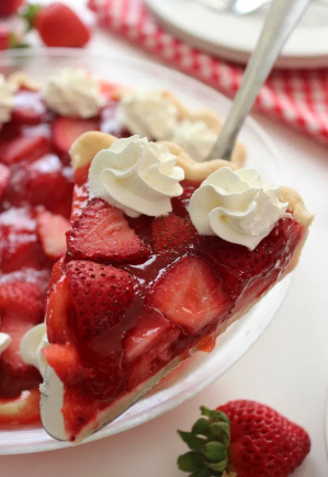 A slice of mouth watering strawberry pie