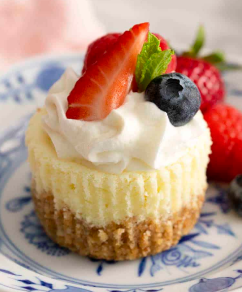 A smooth and creamy banana cream cheesecake recipe topped with bavarian and fresh fruits