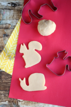 Sugar cookie homemade playdough shaped like a snail and a rabbit