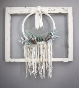 A boho style homemade winter wreath holiday decor