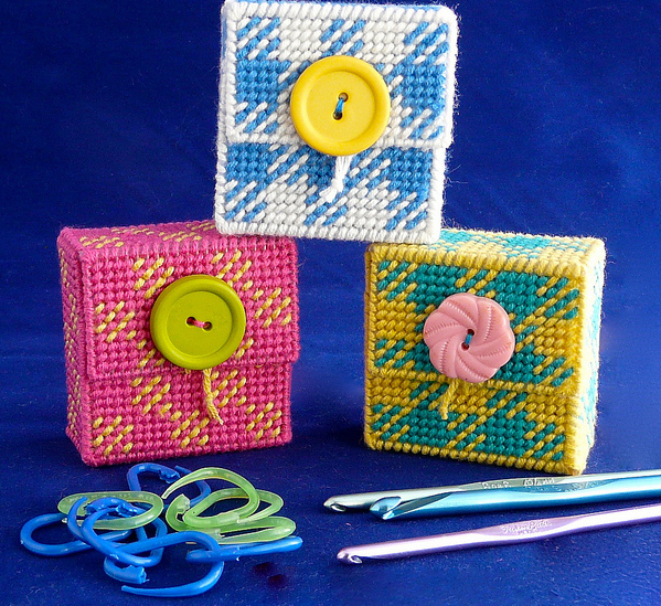 A stitched marker case from plastic canvas using cottonish yarn