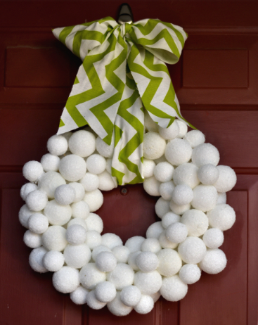 A winter snowball wreath outdoor decor for the holiday