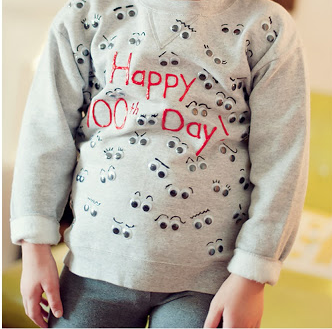 sweatshirt with Happy 100th Day painted on and 100 googly eyes