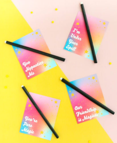 valentines with pencils added to look like magic wands and text saying I'm under your spell