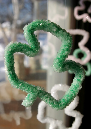 Shamrock made of pipe cleaner covered with crystals