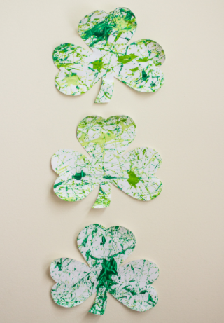 Marble painted shamrock made from a white paper