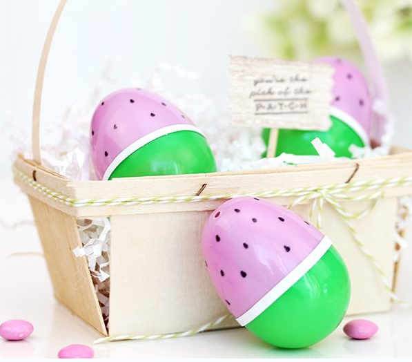 Plastic Easter egg personalized as a watermelon on a basket