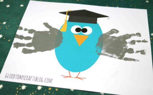 Super easy to make graduation handprint owl with graduation hat