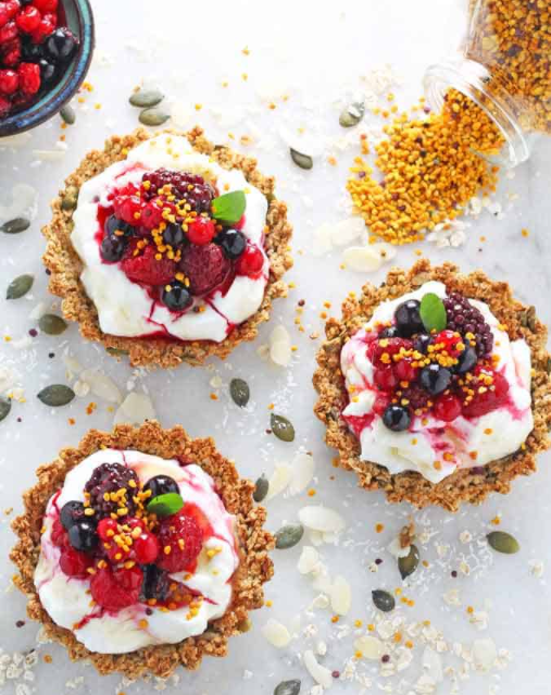 yogurt and berry breakfast tarts with granola crust