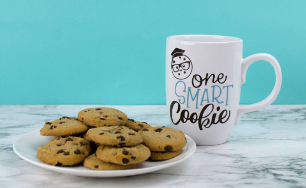 White mug with text saying one smart cookie