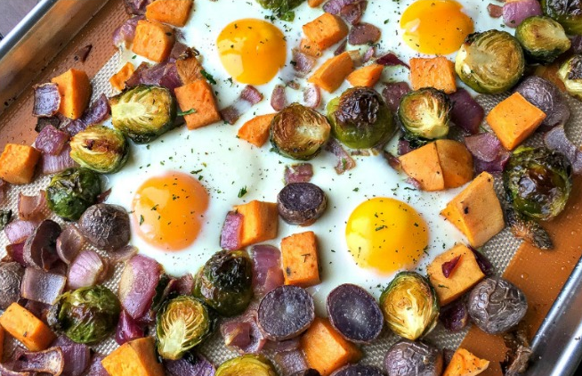 Sweet Potato breakfast hash with 4 sunny side up eggs