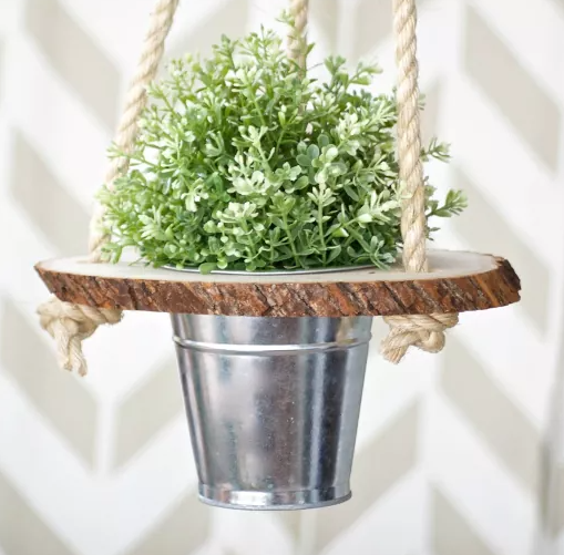 A wood slice hanging planter porch and garden display