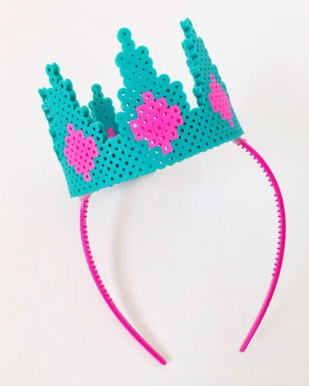 Adorable perler bead crown attached to a headband