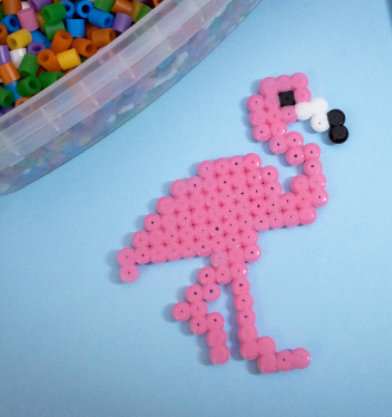 Adorable perler bead flamingo that is a fun project for the kids