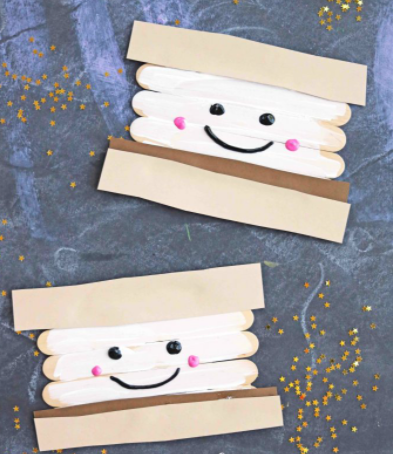 Super cute popsicle sticks smores perfect to make during camping