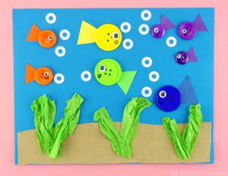 An easy to make button fish craft for kids this summer