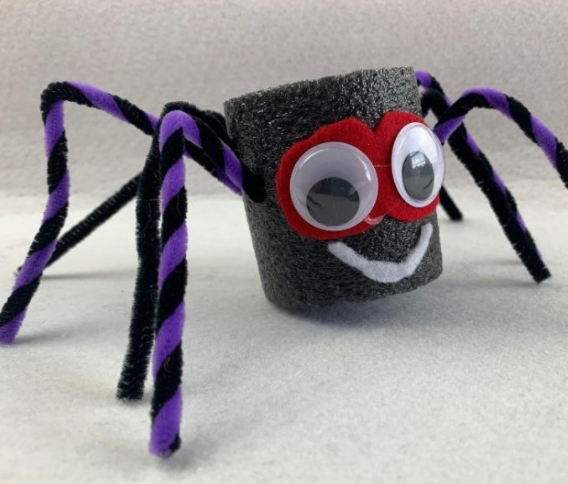 Cute little pool noodle spider with google eyes