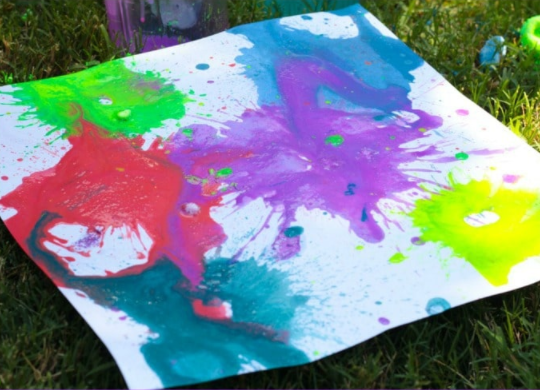 A railroad board with exploded paints a summer STEM activity