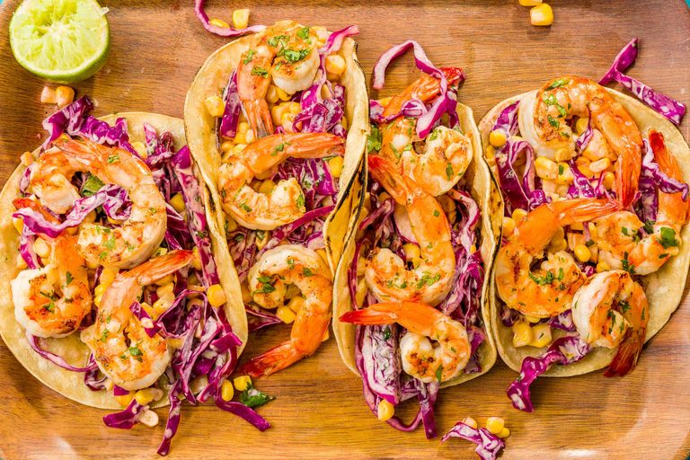 A delicious grilled shrimp tacos with sriracha slaw