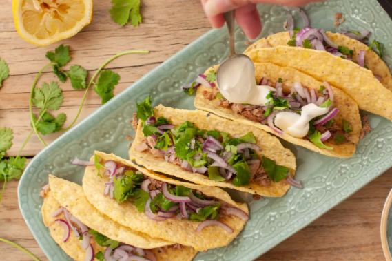 Quick and easy canned tuna fish tacos serve with chips and salsa black bean soup and rice