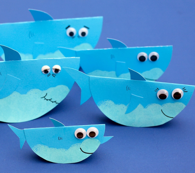 An adorable rocking paper shark family wobbling summer craft for kids