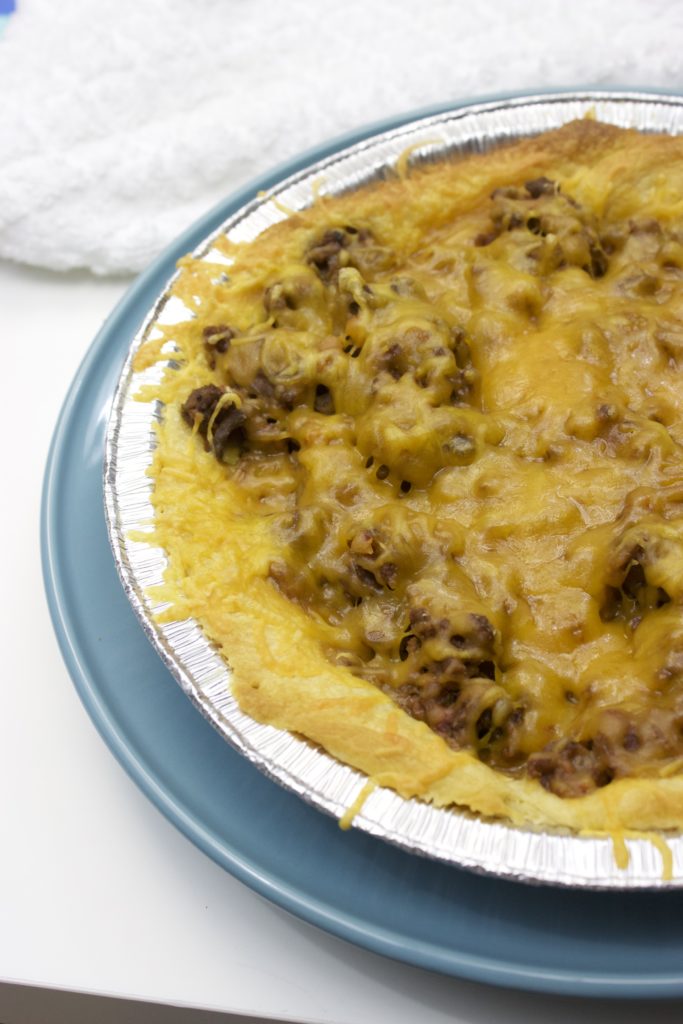 Homemade easy to make taco pie that kids can add their favorite toppings