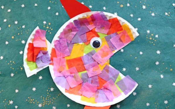 A colorful paper plate and tissue tropical fish kids craft 