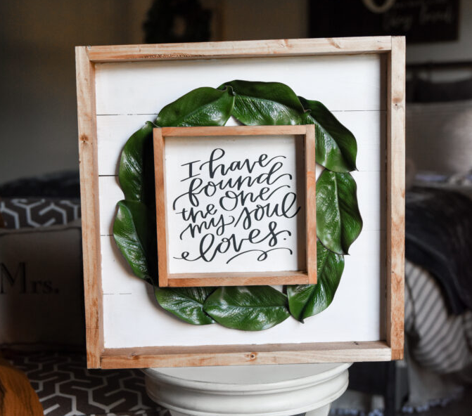 Double framed sign with magnolia accent to it that says I have found the one my soul loves