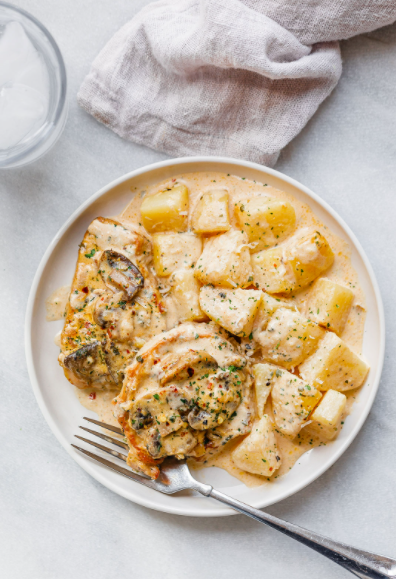 Crockpot Creamy Garlic Pork Chops with Mushrooms and Potatoes